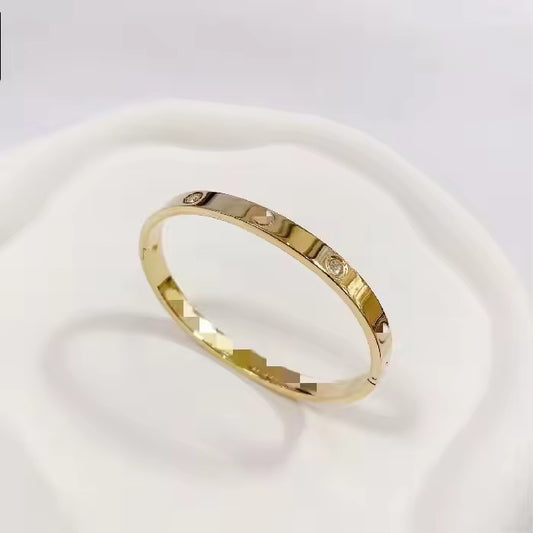 Classic Gold Plated Screw Design Stones Bracelet For Women